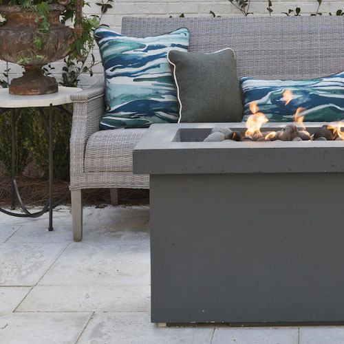 fire pit and outdoor sofa set on patio