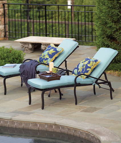 outdoor patio furniture by the pool 